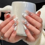 MadeInPanda Nude, White & Silver Chrome Long Stiletto Press On Nails with Statement Rhinestone Accents - premium press on nails