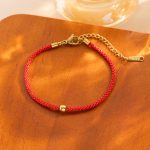 Gold Red String Blessing Ball Bracelet
